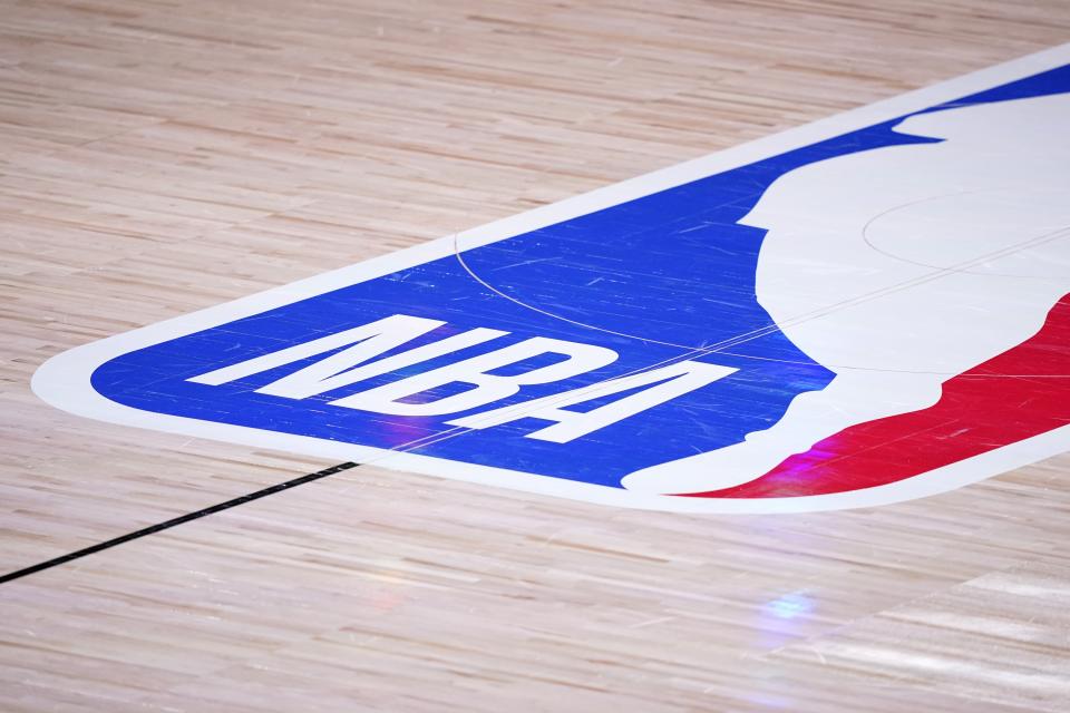 The court floor and league logo are shown after Game 3 of the NBA basketball Western Conference final between the Los Angeles Lakers and Denver Nuggets on Tuesday, Sept. 22, 2020, in Lake Buena Vista, Fla. (AP Photo/Mark J. Terrill)