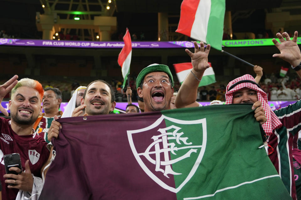 Fluminense fans celebrate on the stands at the end of the Soccer Club World Cup semifinal soccer match between Fluminense FC and Al Ahly FC at King Abdullah Sports City Stadium in Jeddah, Saudi Arabia, Monday, Dec. 18, 2023. Fluminense won 2-0. (AP Photo/Manu Fernandez)