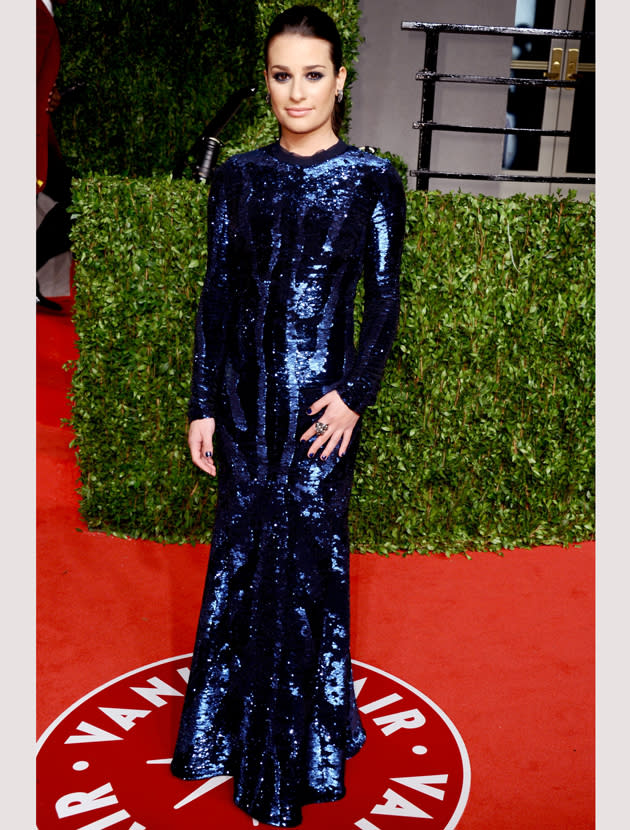 Oscars 2011 photos: The Vanity Fair after party saw Lea Michele cover up in this blue sequined dress.