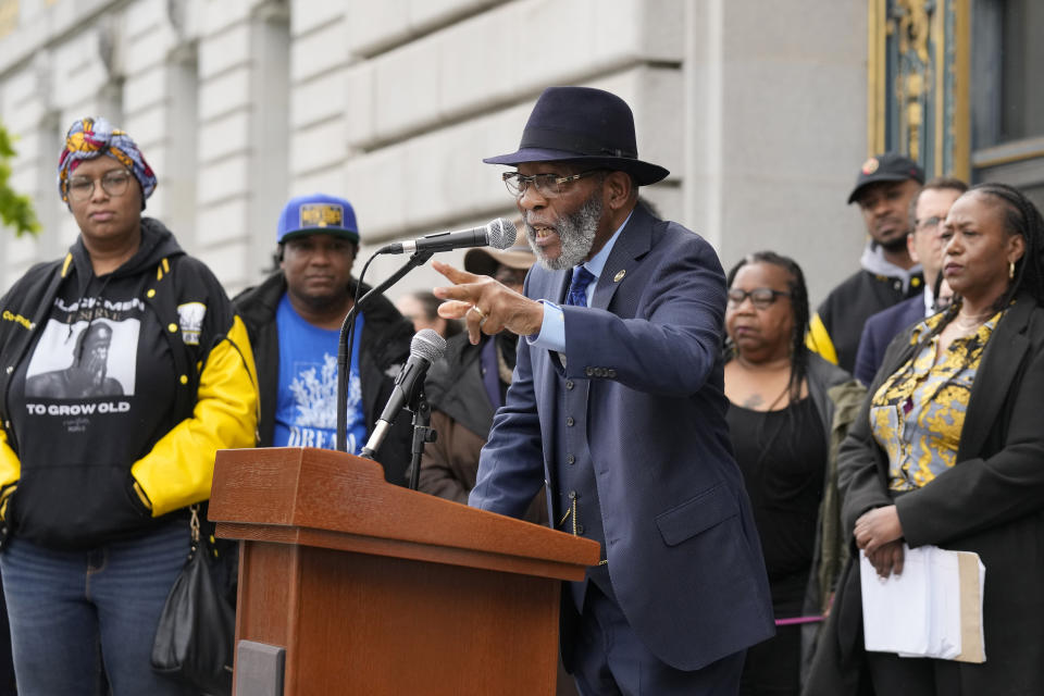 Dr. Amos Brown, middle, speaks at a reparations rally outside of City Hall in San Francisco, Tuesday, March 14, 2023. Supervisors in San Francisco are taking up a draft reparations proposal that includes a $5 million lump-sum payment for every eligible Black person. (AP Photo/Jeff Chiu)