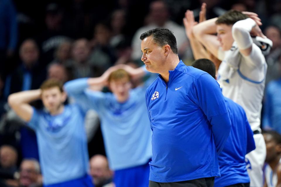 Xavier Musketeers head coach Sean Miller and the Xavier Musketeers bench react to a foul call in the first half of a college basketball game between the Connecticut Huskies and the Xavier Musketeers, Wednesday, Jan. 10, 2024, at Cintas Cetner in Cincinnati.