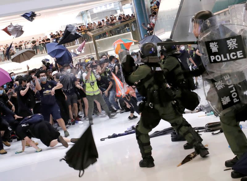 Pictures of the Year: Hong Kong protest tide turns into sea of flames