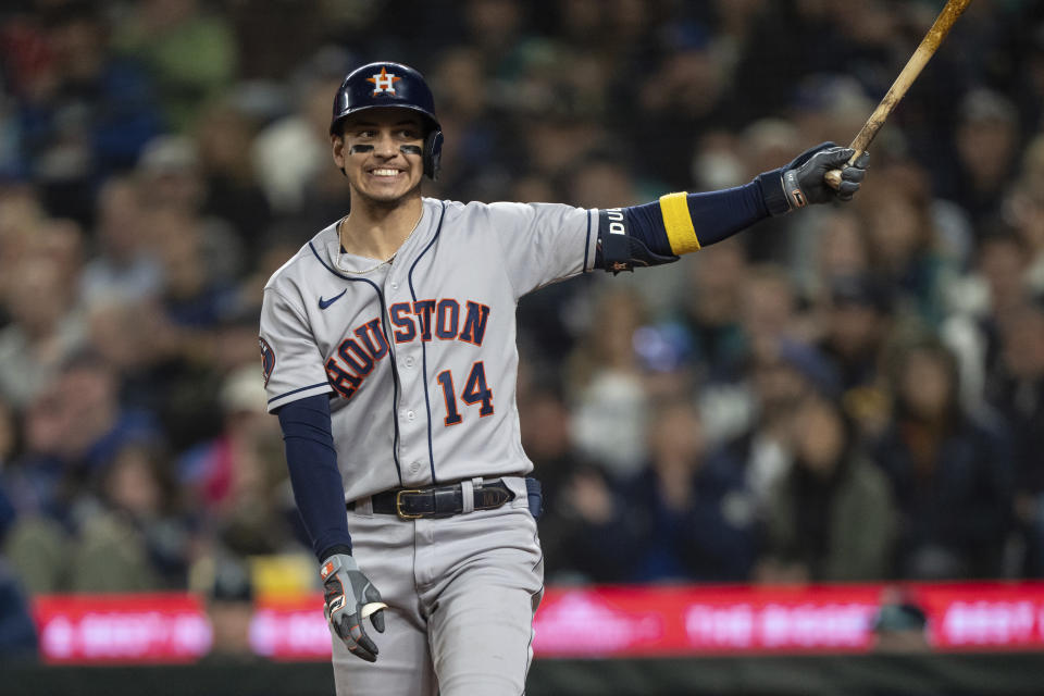 Houston Astros' Mauricio Dubon reacts after strlking out during the sixth inning of a baseball game against the Seattle Mariners, Monday, Sept. 25, 2023, in Seattle. (AP Photo/Stephen Brashear)