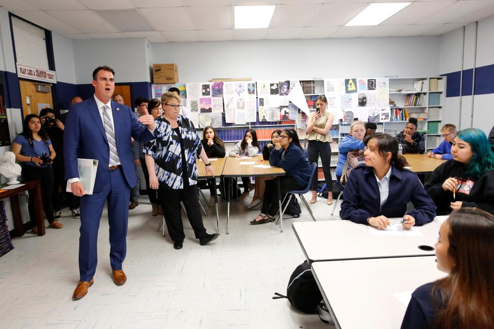 Gov. Kevin Stitt visits several classrooms during a tour of Southeast High School in Oklahoma City on April 10, 2019.