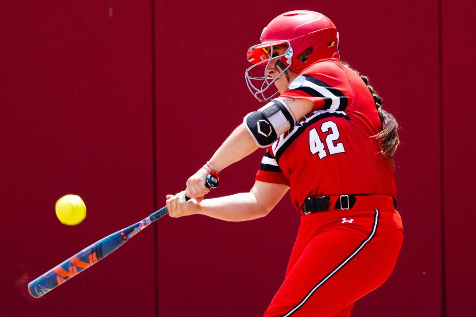 Utah infielder Julia Jimenez (42) hits the ball during the third game of the NCAA softball Super Regional between Utah and San Diego State at Dumke Family Softball Stadium in Salt Lake City on Sunday, May 28, 2023. | Ryan Sun, Deseret News