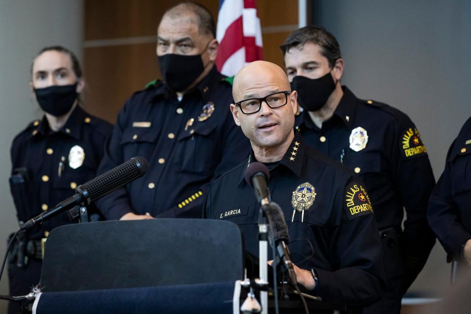 Chief Eddie Garcia, center, speaks with media during a press conference at the Dallas Police Department headquarters on March 4, 2021, in Dallas.
