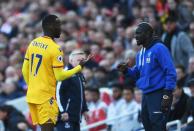 <p>Christian Benteke celebrates scoring the winner against Liverpool alongside on-loan defender Mamadou Sakho </p>