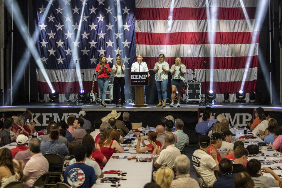 Gov. Brian Kemp announces his bid for re-election at the Georgia National Fairgrounds surrounded by his family on Saturday, July 10, 2021 in Perry, Ga. (Clay Teague/The Macon Telegraph via AP)