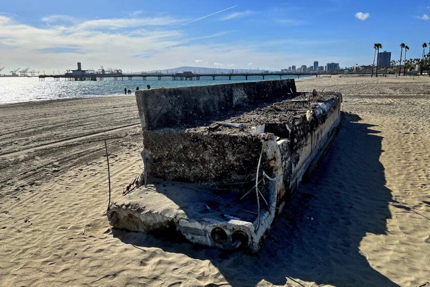 After torrential rains last month, a huge concrete slab the size of a school bus washed up on Junipero Beach .