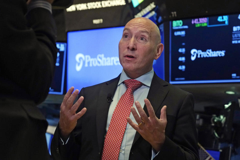 ProShares Global Investment Strategist Simeon Hyman is interviewed on the floor of the New York Stock Exchange, Tuesday, Oct. 19, 2021. ProShares will launch the country's first exchange-traded fund linked to Bitcoin. (AP Photo/Richard Drew)