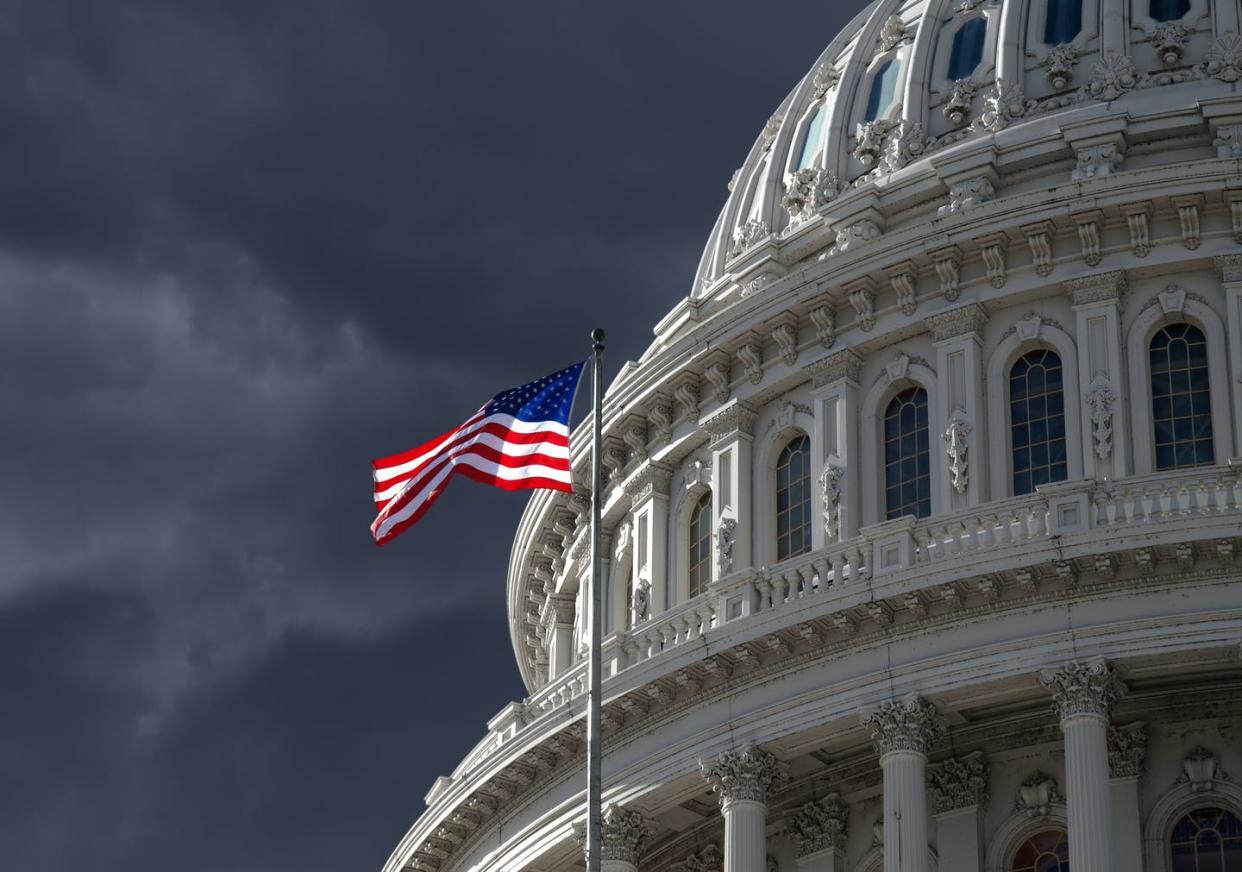 <span class="caption">If the House of Representatives selects the president, each state would get a single vote – not one vote per House member. </span> <span class="attribution"><a class="link " href="https://www.gettyimages.com/detail/photo/dark-sky-over-us-capitol-building-royalty-free-image/164755262?adppopup=true" rel="nofollow noopener" target="_blank" data-ylk="slk:iStock/Getty;elm:context_link;itc:0;sec:content-canvas"> iStock/Getty</a></span>