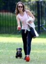 <p>Emilia Clarke plays fetch with her dog on Wednesday in London. </p>