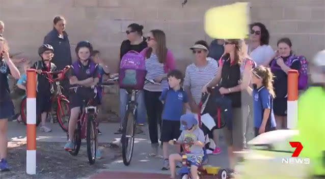 Parents, children waiting at the crossing. Source: 7News