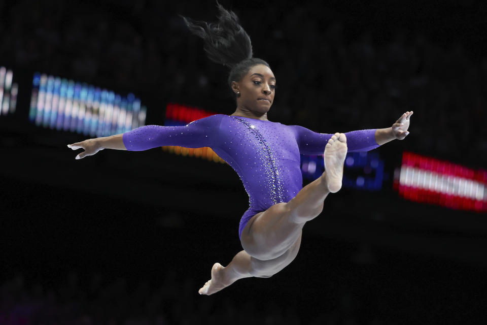 United States' Simone Biles competes on the beam during the apparatus finals at the Artistic Gymnastics World Championships in Antwerp, Belgium, Sunday, Oct. 8, 2023. (AP Photo/Geert vanden Wijngaert)