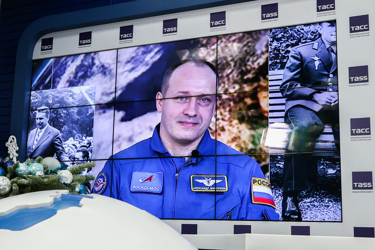 MOSCOW, RUSSIA  DECEMBER 22, 2021: Roscosmos cosmonaut Alexander Misurkin (on the screen) gives a news conference after completing a 12-day mission aboard the International Space Station (ISS) with Japanese space tourists Yusaku Maezawa and Yozo Hirano. Mikhail Tereshchenko/TASS (Photo by Mikhail Tereshchenko\TASS via Getty Images)