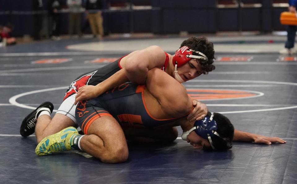 Fox Lane's Alexander Berisha  defeats Horace Greeley's Vincent Sasso in the 189-pound championship match of the Div. 1 wrestling tournament at Horace Greeley High School in Chappaqua on Saturday, February 4, 2023. 