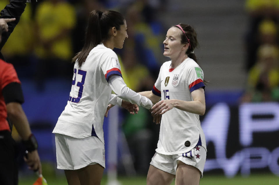 United States' Rose Lavelle, right, is substituted by teammate Christen Press during the Women's World Cup Group F soccer match between Sweden and the United States at Stade Océane, in Le Havre, France, Thursday, June 20, 2019. (AP Photo/Alessandra Tarantino)