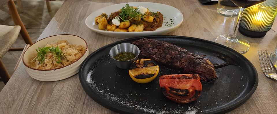 Puffy gnocchi with ropa vieja ($21) and hanger steak ($34) at Unidos.