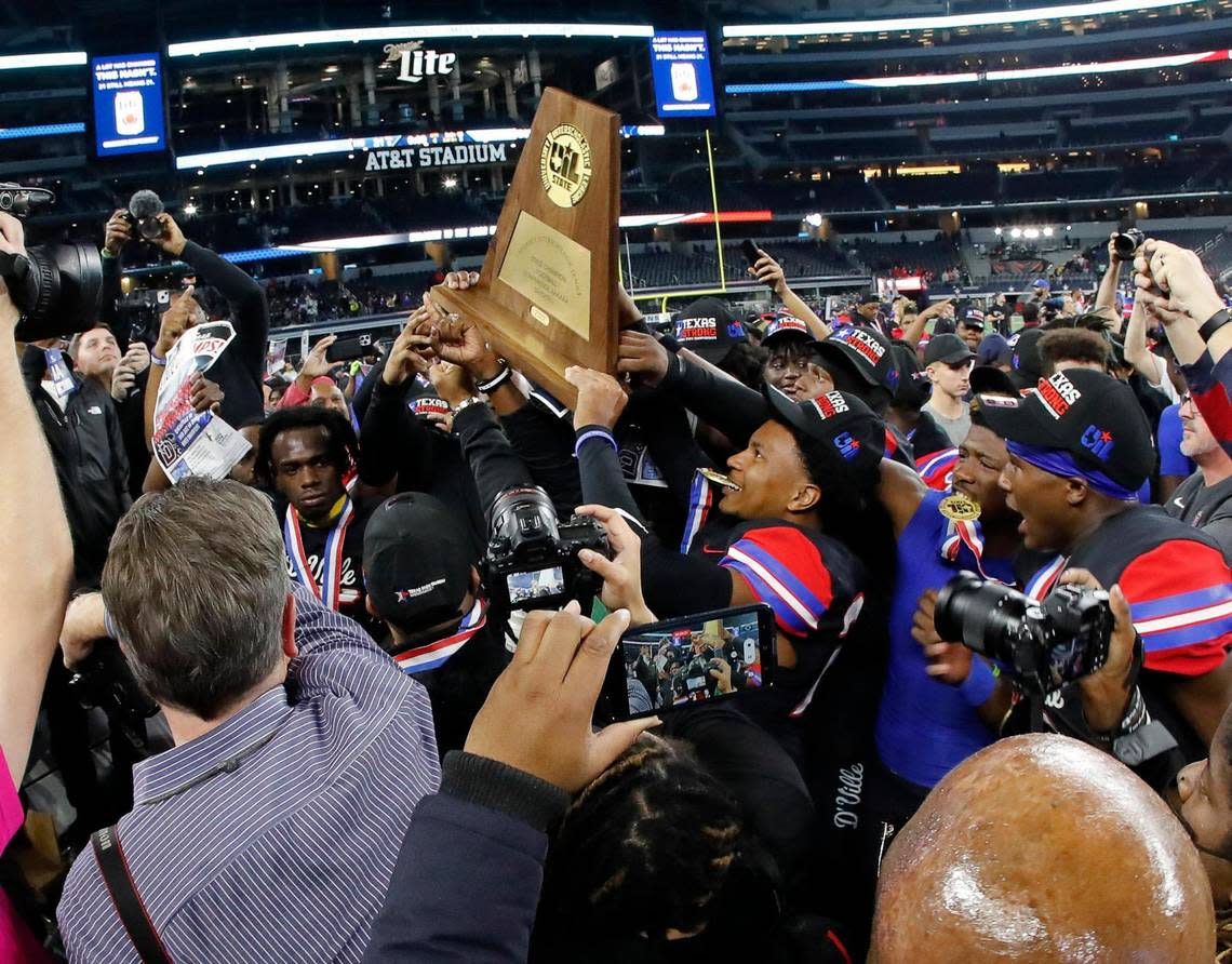 The Duncanville Panthers celebrate winning the UIL Class 6A D1 state championship football game at AT&T Stadium in Arlington, Texas, Saturday, Dec. 16, 2022. Duncanville defeated Galena Park North Shore 28-21. (Star-Telegram Bob Booth)