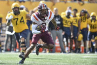FILE - Virginia Tech defensive back Jermaine Waller (2) returns an interception late in the second half of an NCAA college football game against West Virginia in Morgantown, W.Va., in this Saturday, Sept. 18, 2021, file photo. (AP Photo/William Wotring, File)