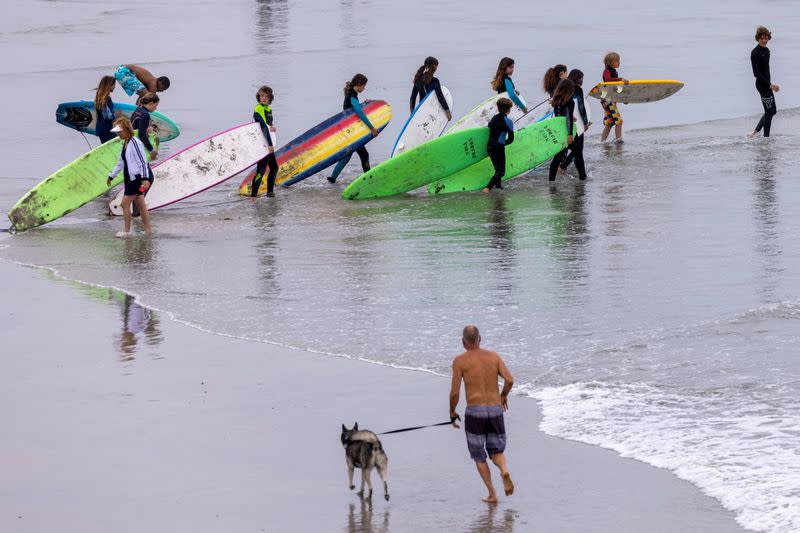 Heatwave sends people to the beach in California