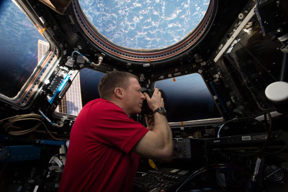 <em>Astronaut Terry Virts wears an Omega Speedmaster Skywalker X-33 in space (NASA)</em>