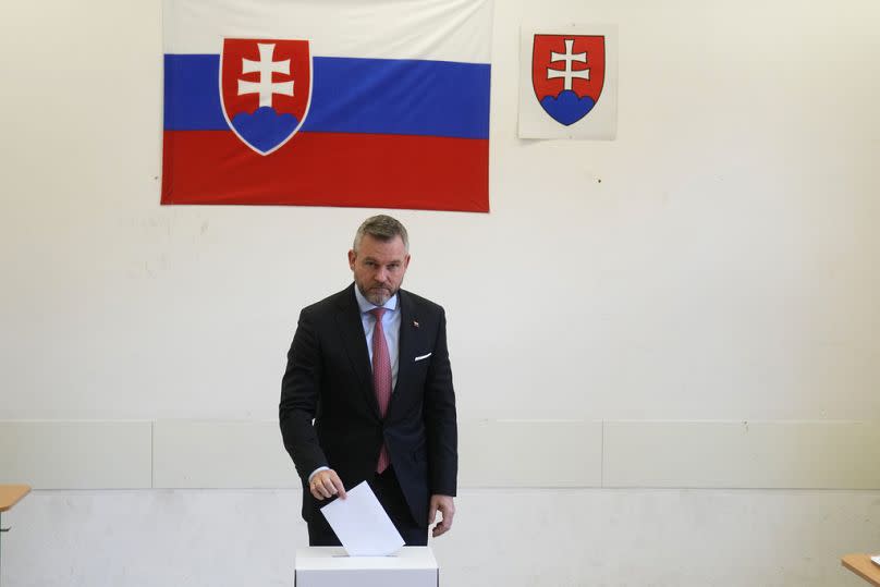 Presidential candidate Peter Pellegrini, who currently serves as Parliament's speaker, casts his vote during the first round of the presidential election.