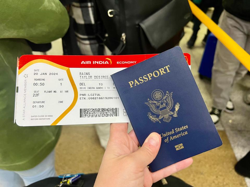 The author's boarding pass and passport.
