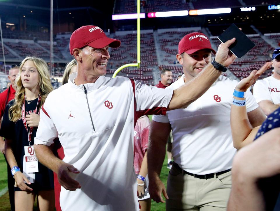 Oklahoma head coach Brent Venables high fives a fan  after the college football game between the University of Oklahoma and the Kent State Golden Flashes at the Gaylord Family Oklahoma Memorial Stadium in Norman, Okla., Saturday, Sept., 10, 2022. 