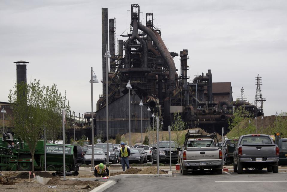 FILE - In this file photo from April 30, 2009, blast furnaces from the historic Bethlehem Steel plant are seen, in Bethlehem, Pa. Las Vegas Sands Corporation's Sands Casino Resort Bethlehem is located on a portion the former site of the Bethlehem Steel plant. A generation ago, this town was booming thanks to a manufacturing behemoth that helped build the New York City skyline, Panama Canal, battleships and countless miles of railway. Now, more than a decade after Bethlehem Steel went bankrupt, the city is reinvigorating itself through a different industry: casino gambling. (AP Photo/Carolyn Kaster, File)