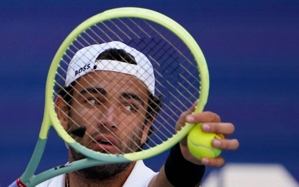 Matteo Berrettini eyes up a big first serve at Flushing Meadows - GETTY