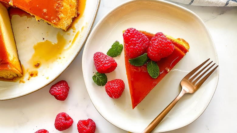 slice of flan with raspberries