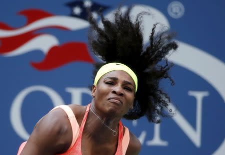 Serena Williams of the U.S. serves to Kiki Bertens of the Netherlands during their match at the U.S. Open Championships tennis tournament in New York, September 2, 2015. REUTERS/Mike Segar