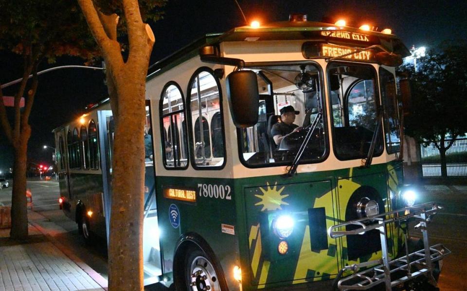 The City of Fresno’s new FresnoHOP, a free trolley service linking Fresno City College, Fresno State’s Campus Pointe, the Cultural Arts District, the Tower District and the Brewery District, prepares to leave the Brewery District Friday night, Nov. 10, 2023 in Fresno.