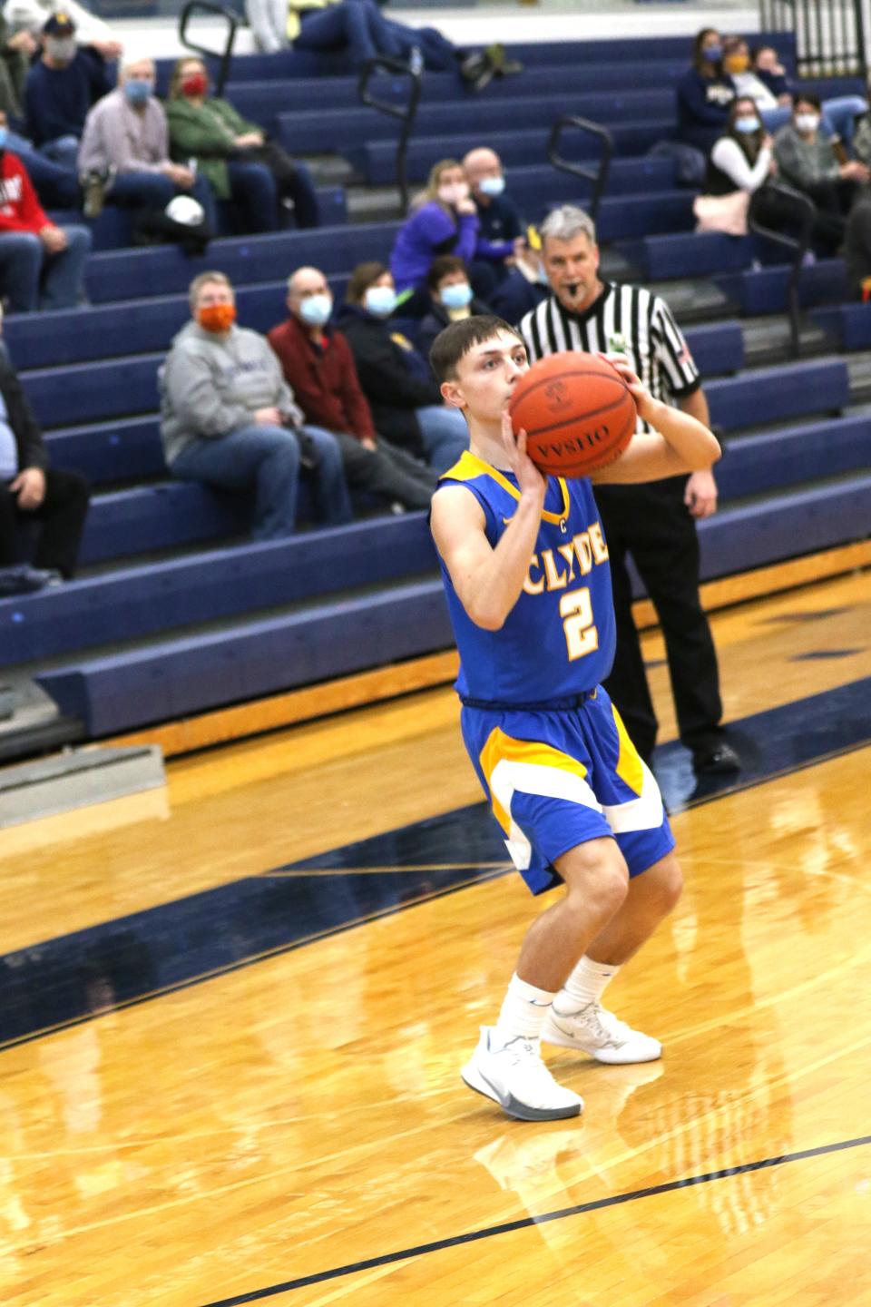 Clyde's Ben Wott eyes a 3-pointer.