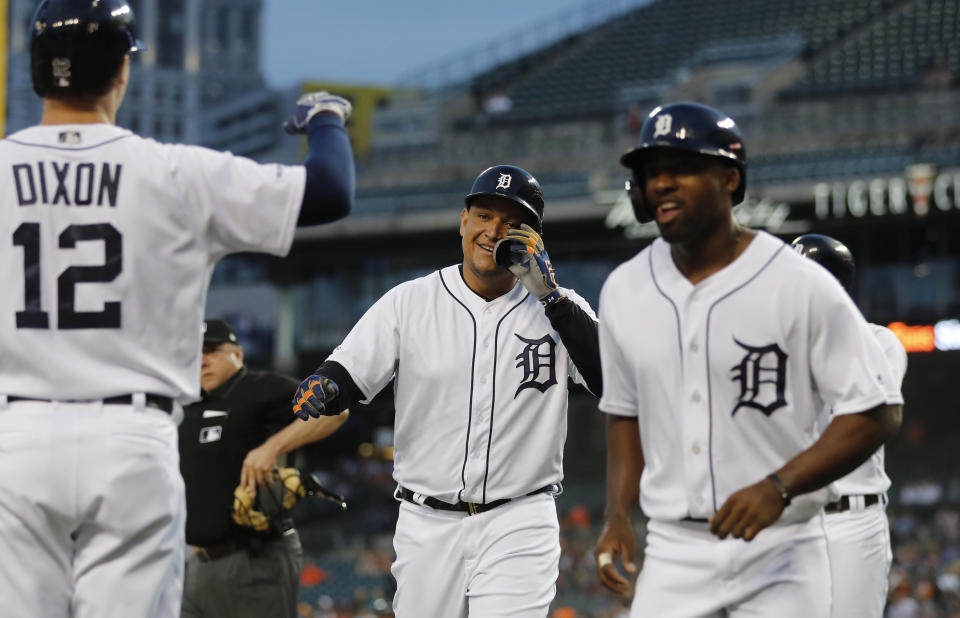Detroit Tigers' Miguel Cabrera, center, walks to the dugout after hitting a grand slam during the fifth inning of the team's baseball game against the Tampa Bay Rays, Tuesday, June 4, 2019, in Detroit. (AP Photo/Carlos Osorio)