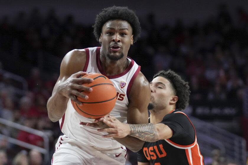 Southern California guard Bronny James (6) drives against Oregon State guard Jordan Pope.