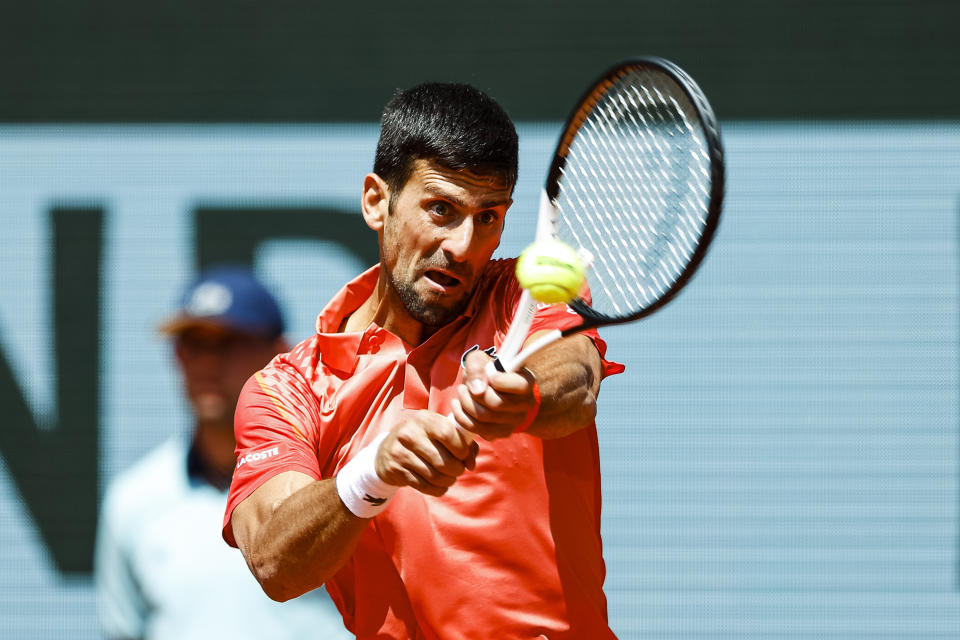 PARIS, FRANCE - MAY 29: Novak Djokovic of Serbia plays a backhand against Aleksander Kovacevic of USA during their First Round Match on Day Two of the 2023 French Open at Roland Garros on May 29, 2023 in Paris, France. (Photo by Antonio Borga/Eurasia Sport Images/Getty Images)
