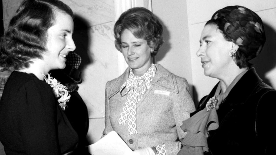 Lady Penn (centre) seen with Princess Margaret (right) at the Savoy Hotel where they attended the Women of the Year luncheon in 1975