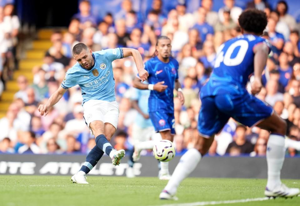 Mateo Kovacic curls home Manchester City’s second goal (Adam Davy/PA Wire)