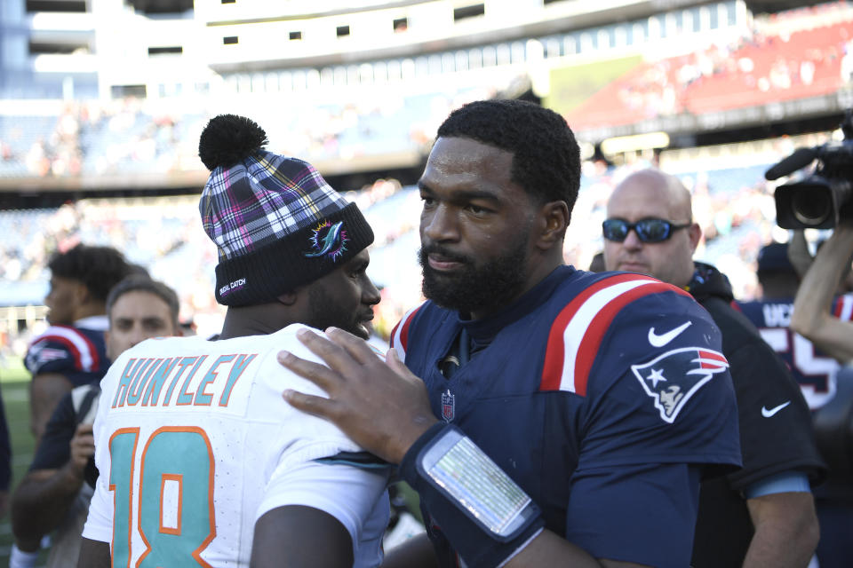 FOXBOROUGH, MASSACHUSETTS - OCTOBER 06: Jacoby Brissett #7 of the New England Patriots and Tyler Huntley #18 of the Miami Dolphins meet after a game at Gillette Stadium on October 06, 2024 in Foxborough, Massachusetts. The Miami Dolphins beat the New England Patriots 15-10. (Photo by Jaiden Tripi/Getty Images)