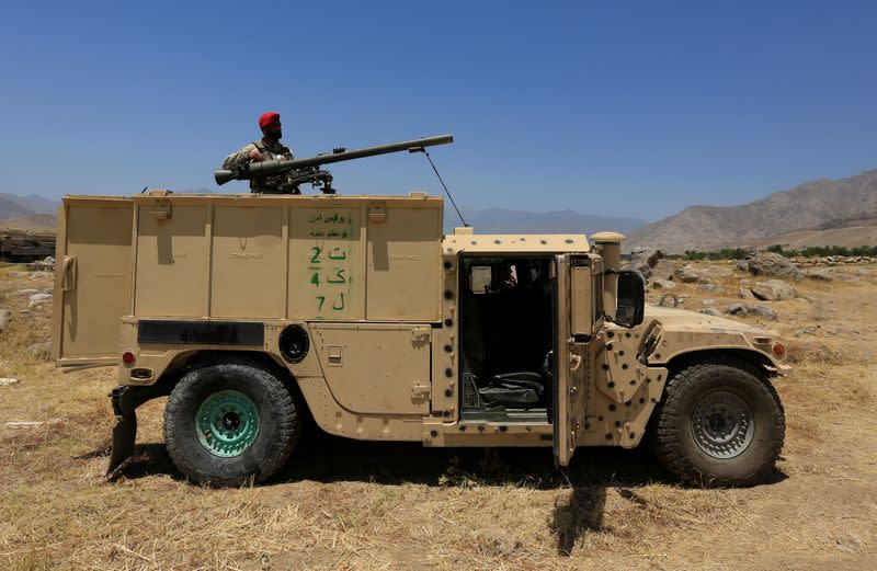 Afghan soldiers recapture checkpoint from the Taliban, in Alishing district of Laghman province