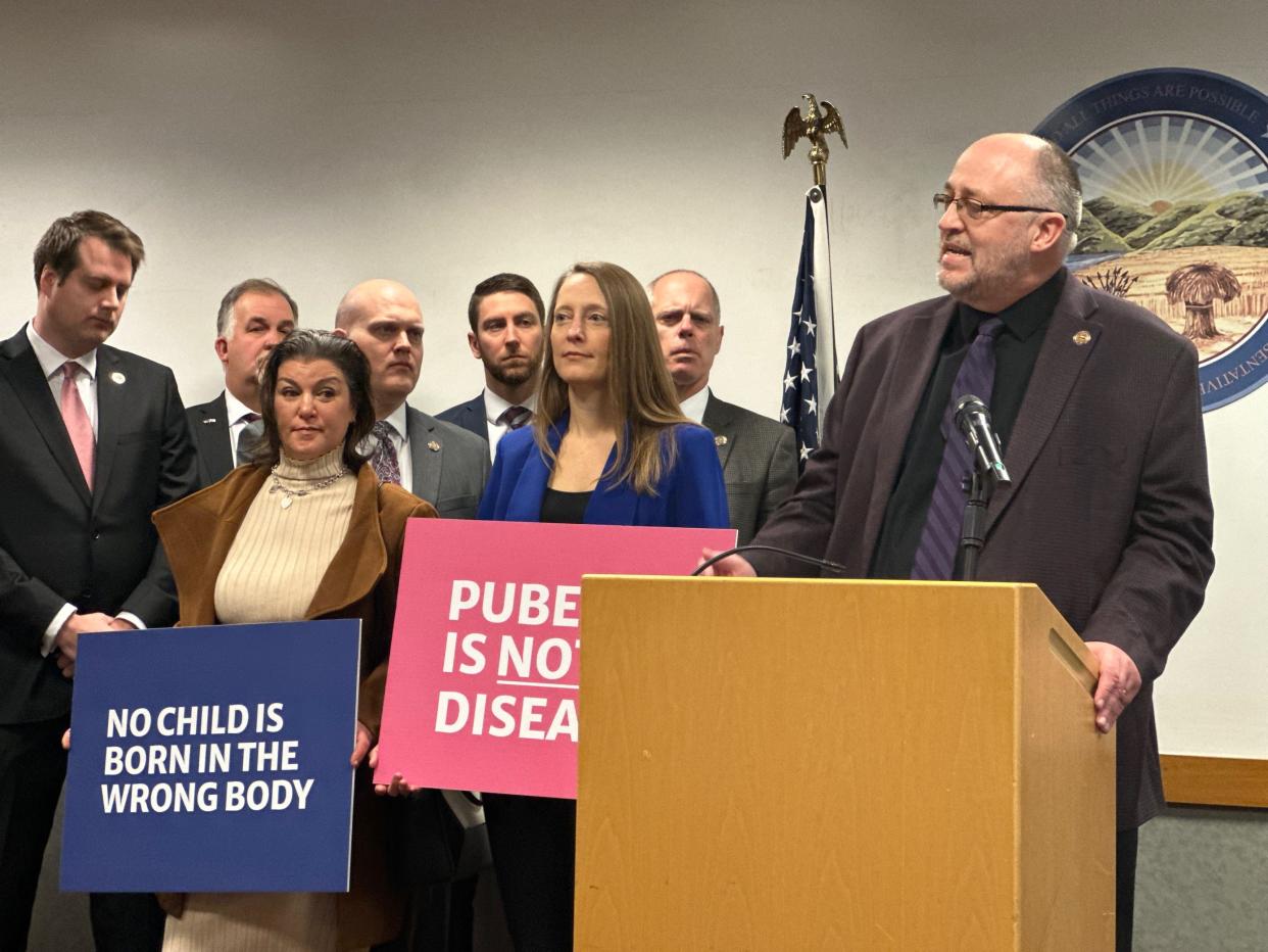 State Rep. Gary Click, R-Vickery, right, is a pastor and primary sponsor of House Bill 68, which would ban transgender minors from taking hormones or undergoing surgery. The bill has passed the Ohio House.