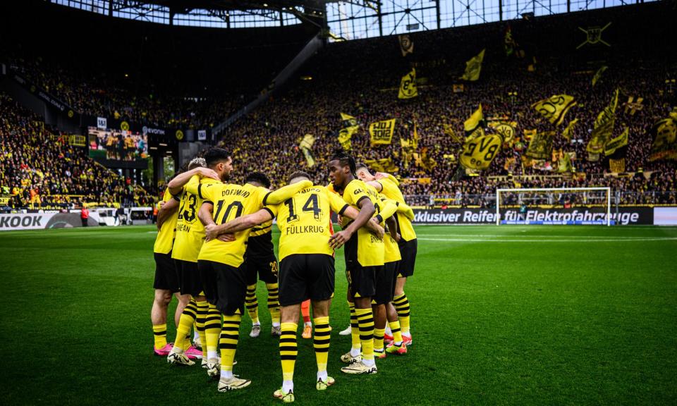 <span>While support for <a class="link " href="https://sports.yahoo.com/soccer/teams/dortmund/" data-i13n="sec:content-canvas;subsec:anchor_text;elm:context_link" data-ylk="slk:Dortmund;sec:content-canvas;subsec:anchor_text;elm:context_link;itc:0">Dortmund</a> is unwavering, there are question marks over the club’s manager, players and at board level.</span><span>Photograph: Lukas Schulze/Bundesliga/Bundesliga Collection/Getty Images</span>