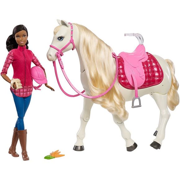 Barbie is pictured with her dream horse