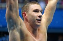 2016 Rio Olympics - Swimming - Final - Men's 100m Backstroke Final - Olympic Aquatics Stadium - Rio de Janeiro, Brazil - 08/08/2016. Ryan Murphy (USA) of USA reacts after winning the gold medal. REUTERS/Michael Dalder