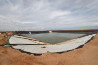 A water storage pond is seen at a wastewater injection facility operated by H20 Midstream in Big Spring, Texas U.S. February 13, 2019. Picture taken February 13, 2019. REUTERS/Nick Oxford