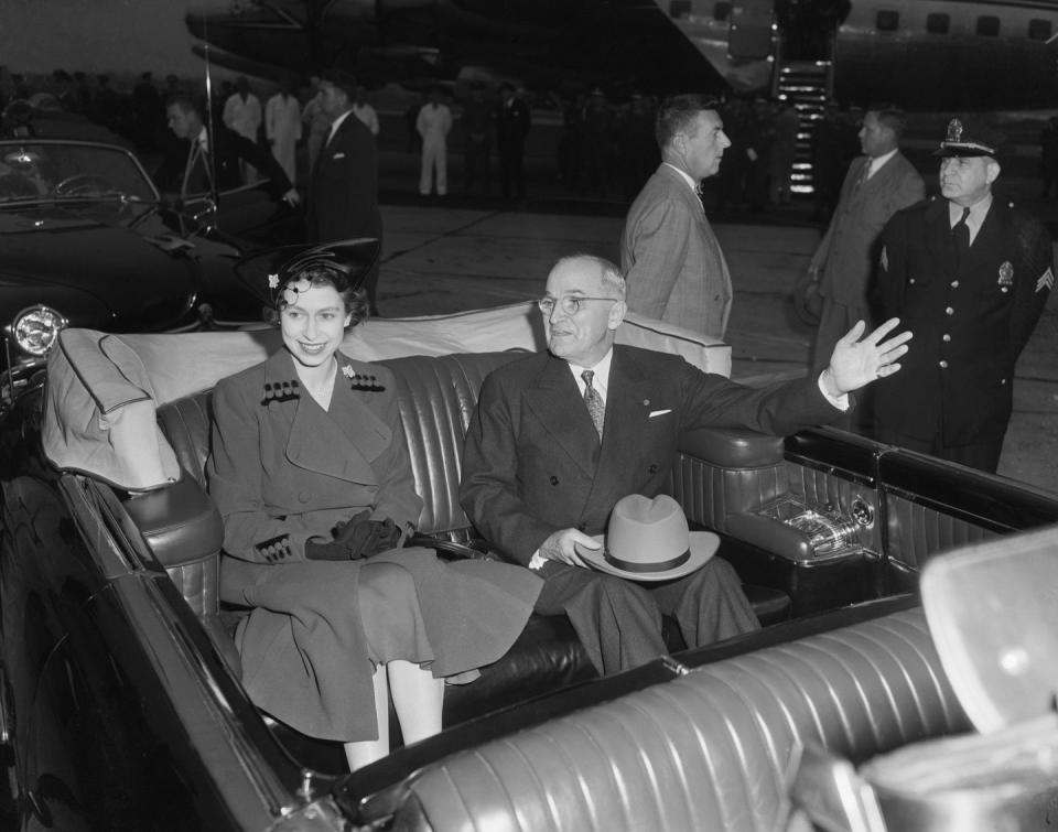 <p>In 1951, Princess Elizabeth began strengthening the relationship between the White House and Buckingham Palace. Here, she and President Harry Truman leave a reception together. "Margaret [Truman] tells me that whenever anyone becomes acquainted with you they immediately fall in love," Truman <a href="https://www.whitehousehistory.org/photos/queen-elizabeth-ii-princess-elizabeth-visits" rel="nofollow noopener" target="_blank" data-ylk="slk:reportedly told her" class="link ">reportedly told her</a>. </p>