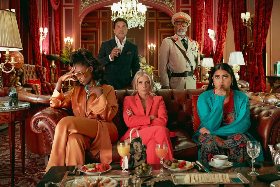 Murder Mystery 2. (L-R) Jodie Turner-Smith as Countess, Enrique Arce as Francisco, Melanie Laurent as Claudette Joubert, John Kani as Colonel Ulenga and Kuhoo Verma as Saira in Murder Mystery 2.