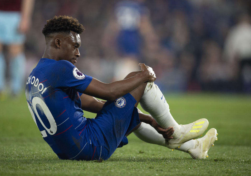 LONDON, ENGLAND - APRIL 22: Callum Hudson-Odoi of Chelsea feels his right achilles after falling to the ground during the Premier League match between Chelsea FC and Burnley FC at Stamford Bridge on April 22, 2019 in London, United Kingdom. (Photo by Visionhaus/Getty Images)